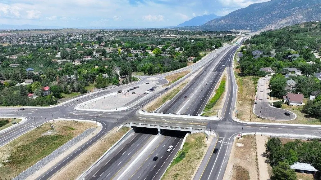 Aerial view of a rebuilt US-89 interchange below the mountains